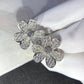 FRIVOLE SILVER FLOWER DIAMOND EARRINGS